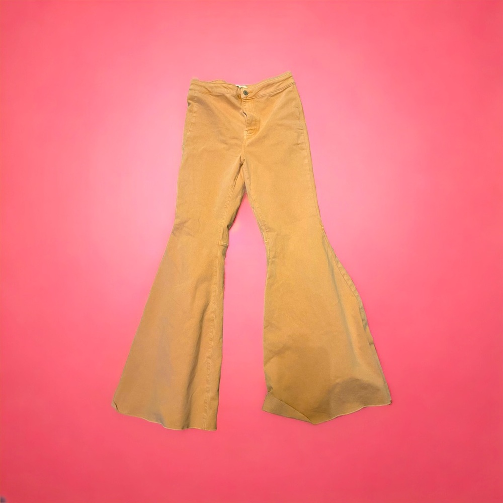 We the Free Light Orange Super Flare Bell Bottom Jeans.